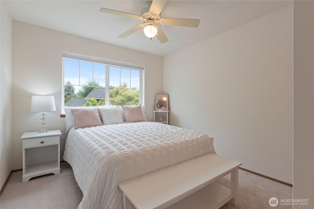 2433 18th St SE, Puyallup, WA 98374 - bedroom with light carpet, baseboards, and ceiling fan