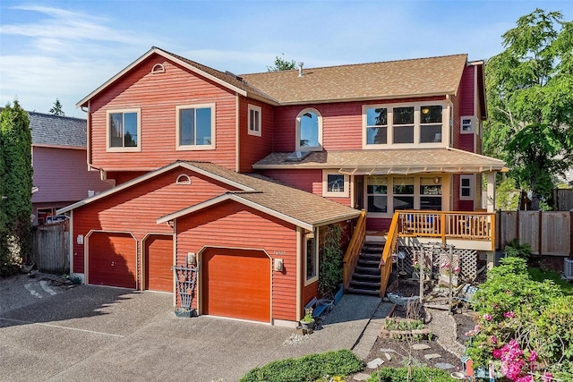16515 126th Ave NE, Woodinville, WA 98072 - view of front of house featuring stairs, covered porch, asphalt driveway, and a shingled roof