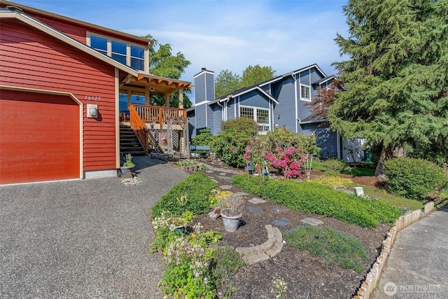 16515 126th Ave NE, Woodinville, WA 98072 - view of home's exterior with stairway and a porch