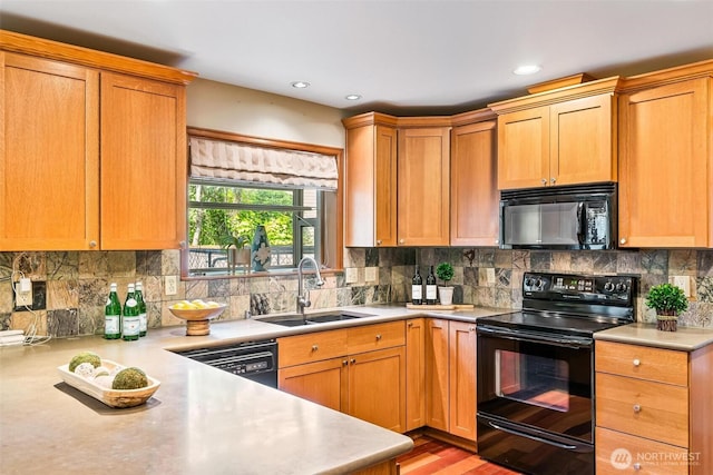 16515 126th Ave NE, Woodinville, WA 98072 - kitchen with black appliances, a sink, light countertops, tasteful backsplash, and recessed lighting