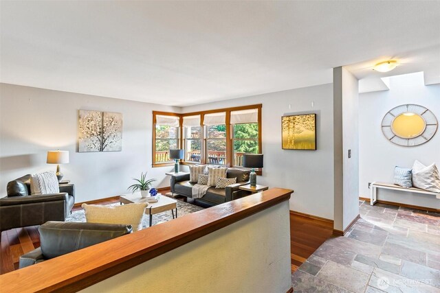 16515 126th Ave NE, Woodinville, WA 98072 - living room with baseboards and stone finish floors