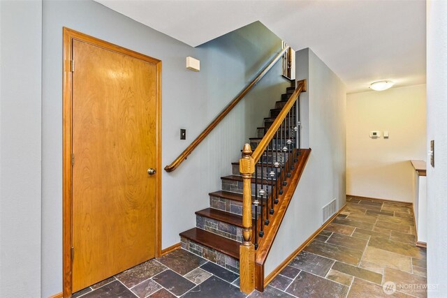 16515 126th Ave NE, Woodinville, WA 98072 - stairway with stone tile floors and baseboards