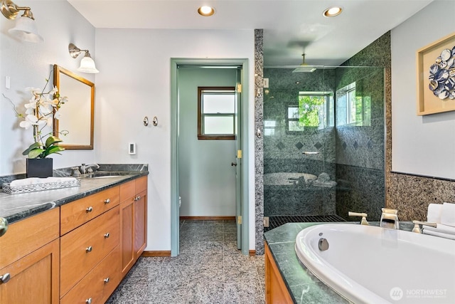 16515 126th Ave NE, Woodinville, WA 98072 - full bath featuring a tile shower, a bath, double vanity, recessed lighting, and baseboards