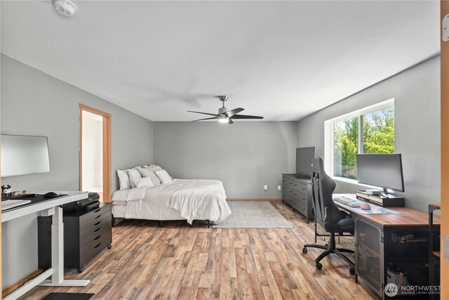 138 Stamper Rd, Elma, WA 98541 - bedroom featuring an office area, light wood-style floors, and a ceiling fan