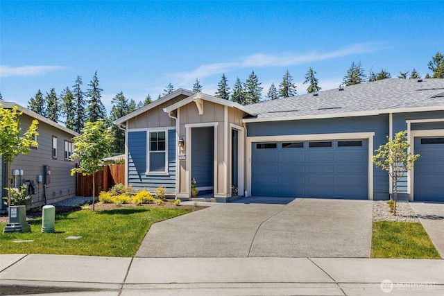 29215 217th Ct SE, Black Diamond, WA 98010 - view of front of property with concrete driveway, an attached garage, and board and batten siding