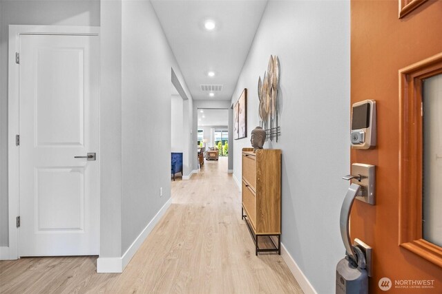 29215 217th Ct SE, Black Diamond, WA 98010 - corridor featuring light wood-style flooring, baseboards, and recessed lighting