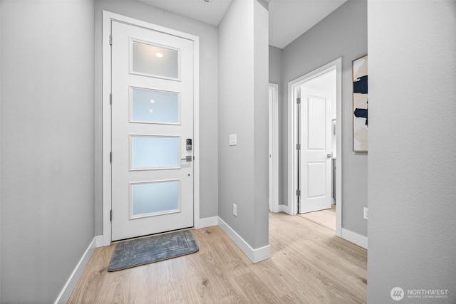 29215 217th Ct SE, Black Diamond, WA 98010 - foyer entrance featuring light wood-style floors and baseboards