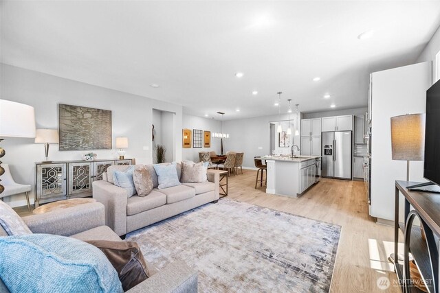 29215 217th Ct SE, Black Diamond, WA 98010 - living area featuring recessed lighting and light wood finished floors