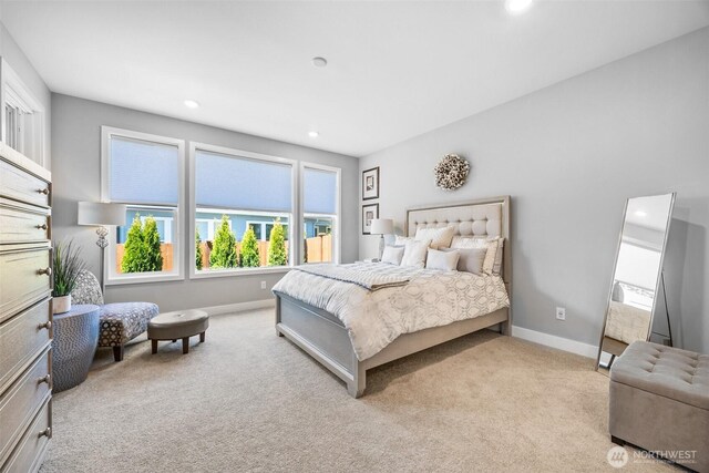 29215 217th Ct SE, Black Diamond, WA 98010 - carpeted bedroom featuring multiple windows, baseboards, and recessed lighting