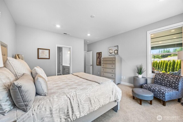 29215 217th Ct SE, Black Diamond, WA 98010 - bedroom featuring light colored carpet, recessed lighting, and ensuite bath