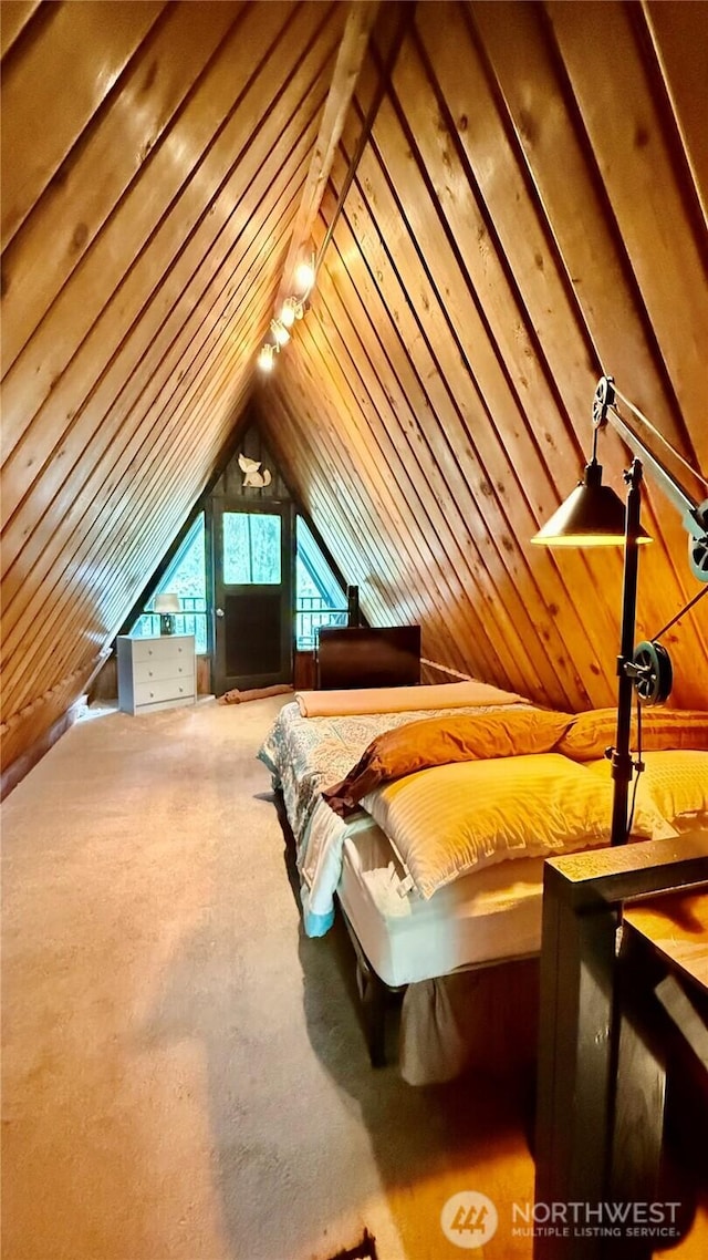 148 Seagate St SW, Ocean Shores, WA 98569 - bedroom featuring lofted ceiling and carpet