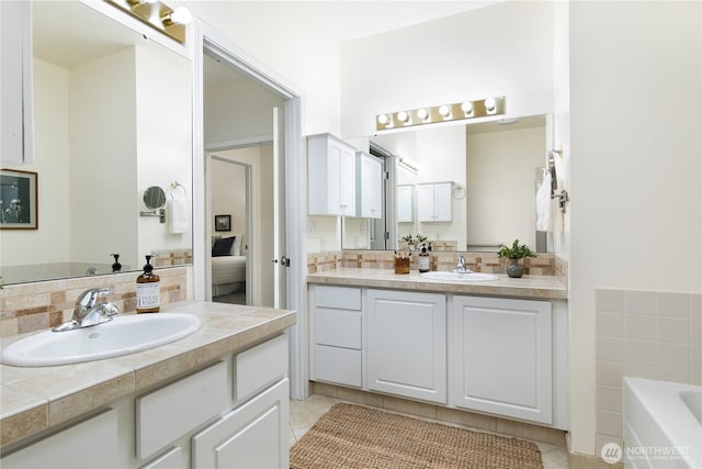 7417 53rd Street Ct W, University Place, WA 98467 - full bathroom with vanity, connected bathroom, decorative backsplash, and a garden tub