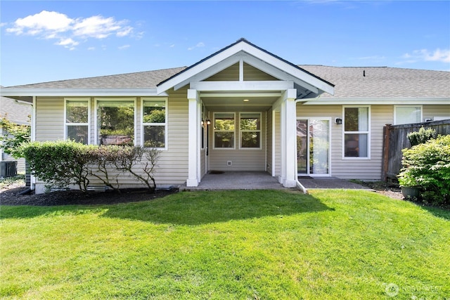 7417 53rd Street Ct W, University Place, WA 98467 - rear view of property featuring a yard, roof with shingles, and a patio area