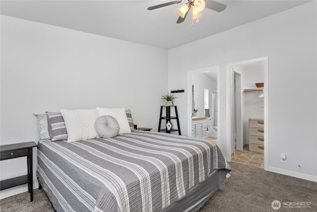 300 SW 7th Ave Unit 127, Battle Ground, WA 98604 - carpeted bedroom with ensuite bathroom and a ceiling fan