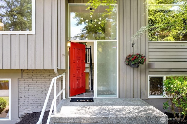 5 Wembley Ln, Mercer Island, WA 98040 - entrance to property featuring board and batten siding and brick siding