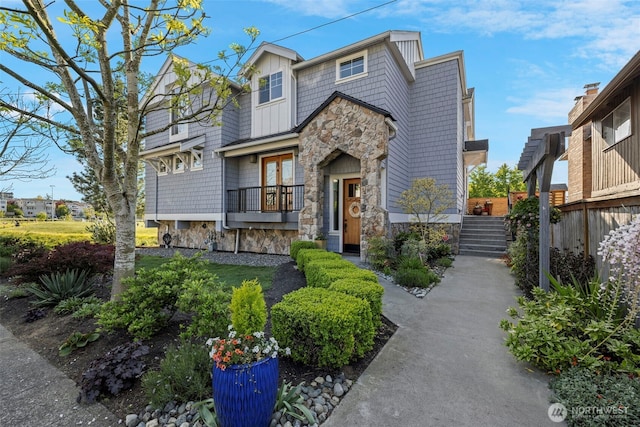 656 Daley St Unit 102, Edmonds, WA 98020 - view of front facade with stone siding and board and batten siding