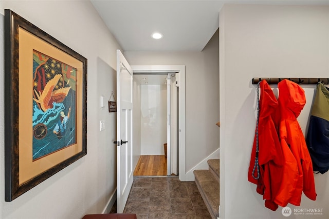 656 Daley St Unit 102, Edmonds, WA 98020 - hall with baseboards, recessed lighting, and stairs