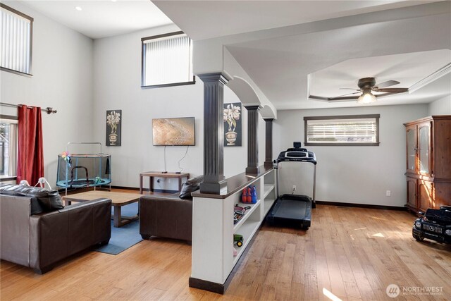 1875 Mckinley St, Ferndale, WA 98248 - exercise area with ornate columns, light wood-type flooring, and plenty of natural light