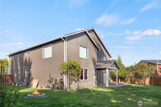 1875 Mckinley St, Ferndale, WA 98248 - back of house featuring an outdoor fire pit, central air condition unit, and a patio