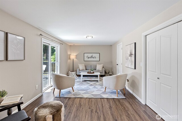 8908 216th Street Ct E, Graham, WA 98338 - living room with dark wood-style floors and baseboards