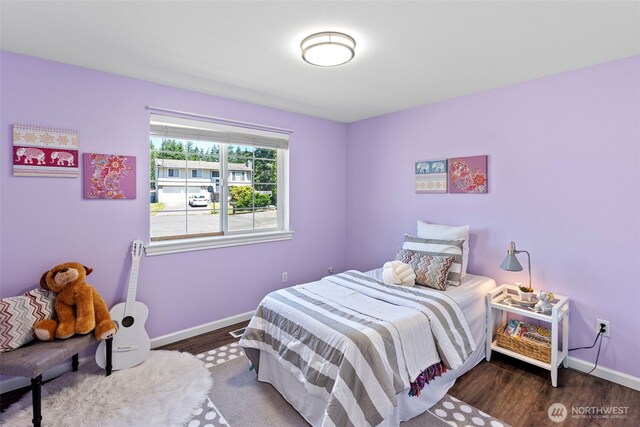 8908 216th Street Ct E, Graham, WA 98338 - bedroom featuring baseboards and dark wood finished floors