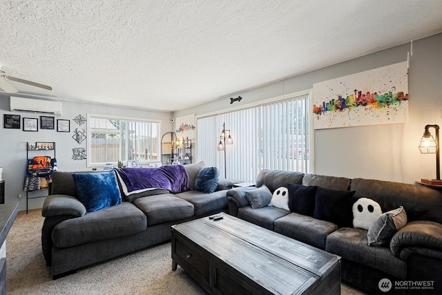 260 Baltimore St, Longview, WA 98632 - living area featuring a wall mounted air conditioner, light carpet, a textured ceiling, and ceiling fan