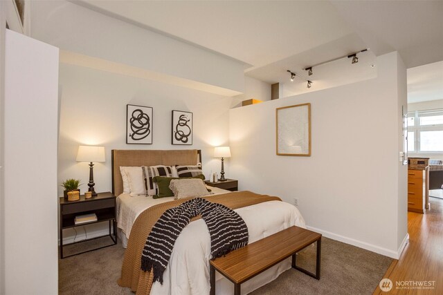17 W Mercer St Unit 218, Seattle, WA 98119 - bedroom with track lighting and baseboards