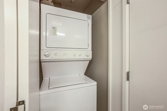 17 W Mercer St Unit 218, Seattle, WA 98119 - washroom with estacked washer and dryer
