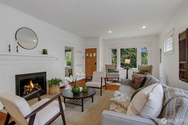 2433 E Valley St, Seattle, WA 98112 - living room with a brick fireplace, wood finished floors, and recessed lighting