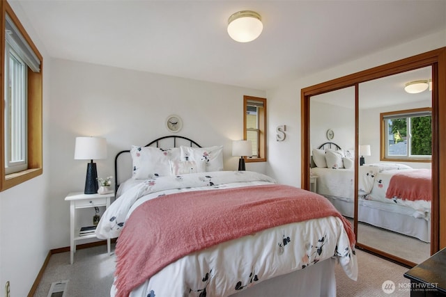 2433 E Valley St, Seattle, WA 98112 - bedroom featuring carpet, a closet, and baseboards