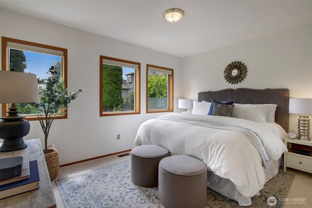 2433 E Valley St, Seattle, WA 98112 - carpeted bedroom featuring baseboards