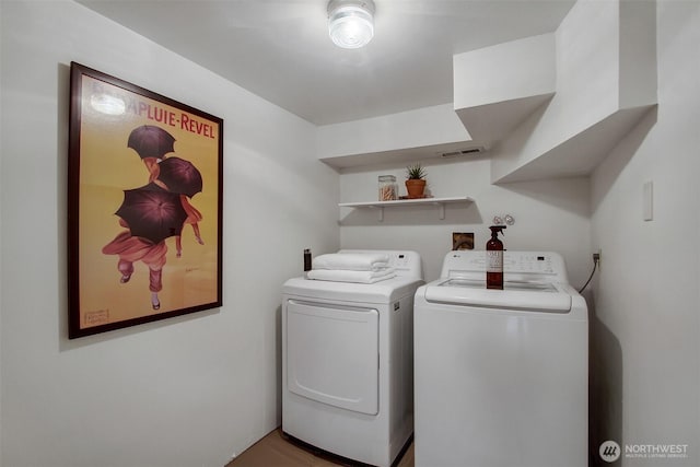 2433 E Valley St, Seattle, WA 98112 - laundry area featuring separate washer and dryer