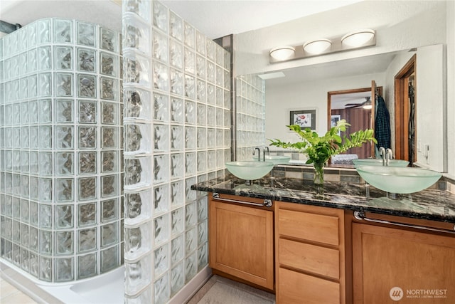13911 Meridian Ave N, Marysville, WA 98271 - bathroom with double vanity and walk in shower