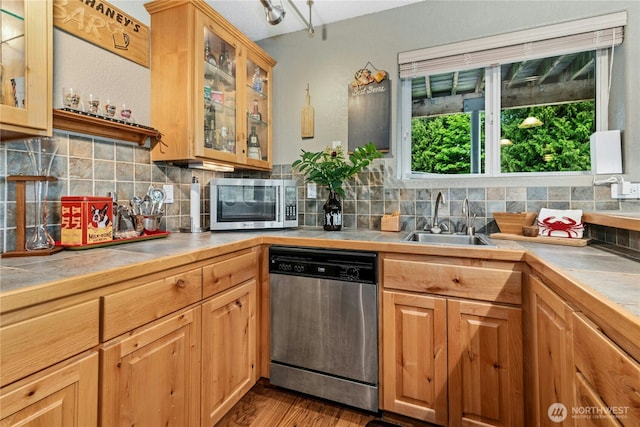 13911 Meridian Ave N, Marysville, WA 98271 - kitchen featuring stainless steel appliances, a sink, tile countertops, and tasteful backsplash