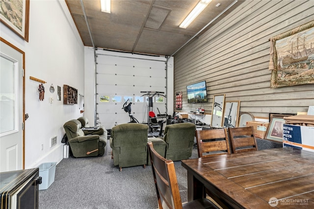 13911 Meridian Ave N, Marysville, WA 98271 - dining space with wooden walls and carpet