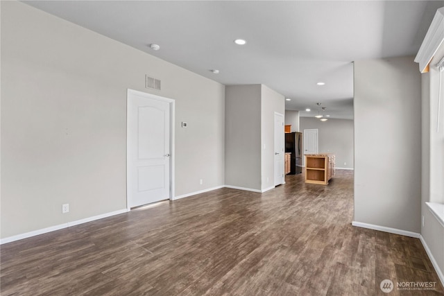 3516 Meadowbrook Ln SE, Lacey, WA 98503 - unfurnished living room with recessed lighting, dark wood-style floors, and baseboards