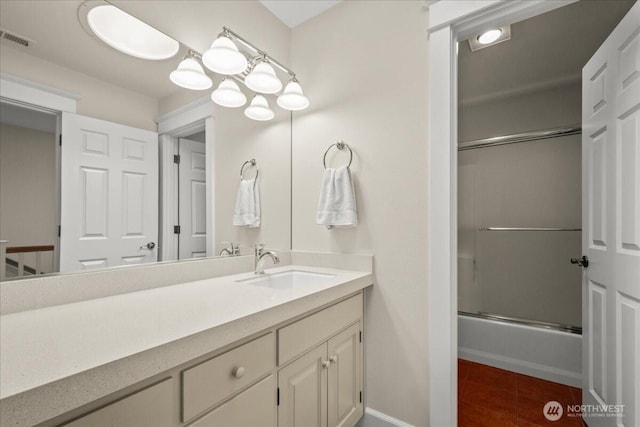 1259 Insel Rd, Woodland, WA 98674 - full bath featuring vanity, enclosed tub / shower combo, baseboards, and tile patterned floors