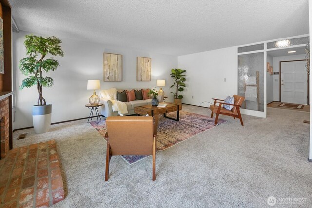 14210 NE 63rd Ct, Redmond, WA 98052 - carpeted living area featuring a textured ceiling and baseboards