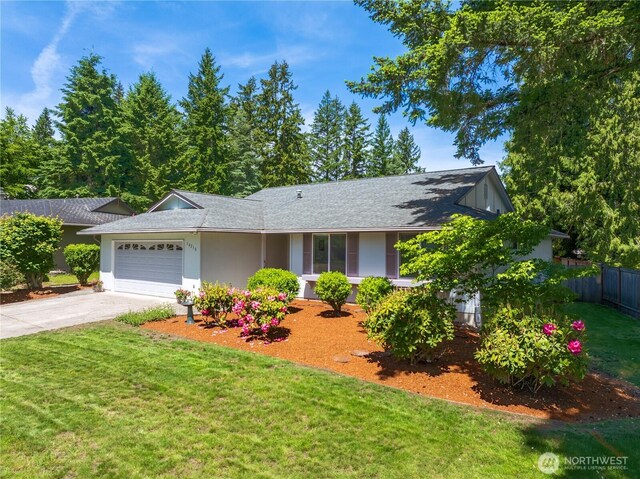 14210 NE 63rd Ct, Redmond, WA 98052 - view of front facade with an attached garage, driveway, a shingled roof, and stucco siding
