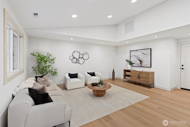 7118 177th St SW, Edmonds, WA 98026 - living room with recessed lighting, light wood-style flooring, lofted ceiling, and baseboards