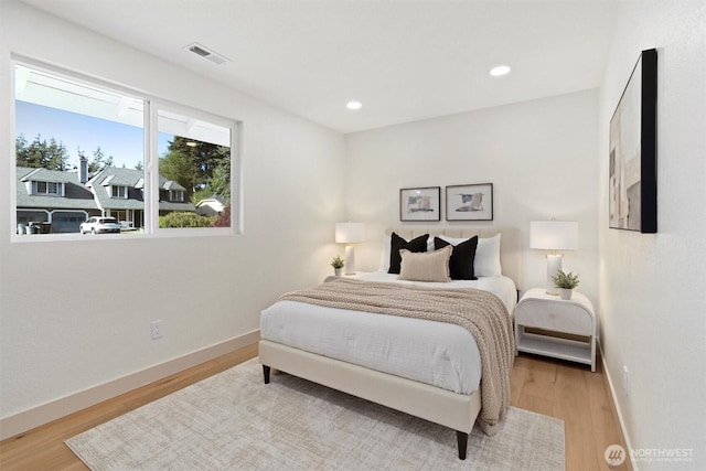 7118 177th St SW, Edmonds, WA 98026 - bedroom featuring light wood-type flooring, baseboards, and recessed lighting