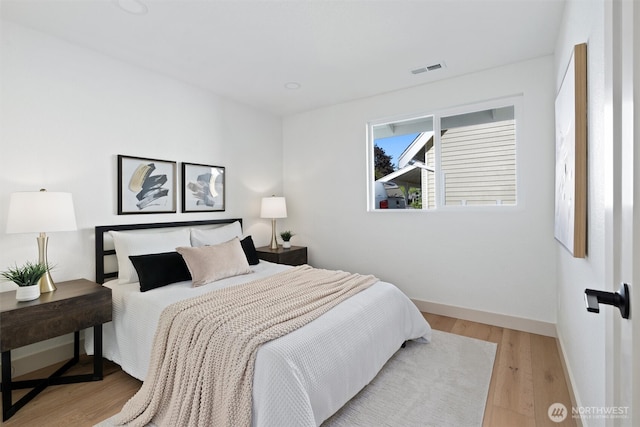 7118 177th St SW, Edmonds, WA 98026 - bedroom with baseboards and light wood finished floors