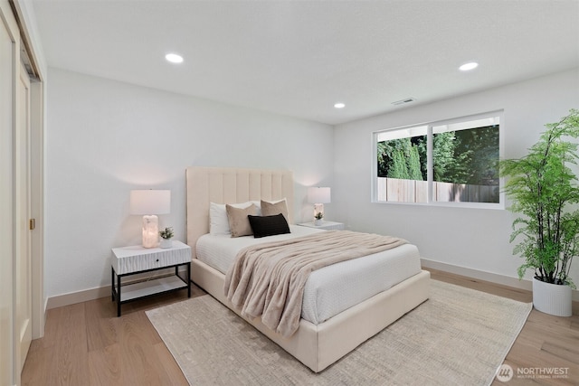 7118 177th St SW, Edmonds, WA 98026 - bedroom featuring wood finished floors, baseboards, and recessed lighting