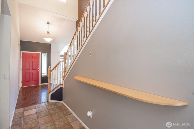 19011 89th Ave E, Puyallup, WA 98375 - entryway with stone finish flooring, stairs, and baseboards