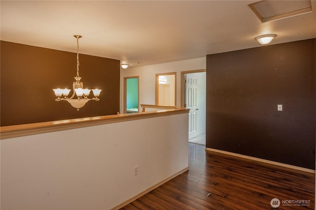 19011 89th Ave E, Puyallup, WA 98375 - kitchen with dark wood-style floors, a chandelier, decorative light fixtures, and baseboards