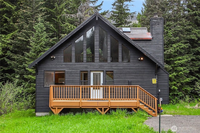 1051 Yellowstone, Snoqualmie Pass, WA 98068 - rear view of house with a chimney and a deck