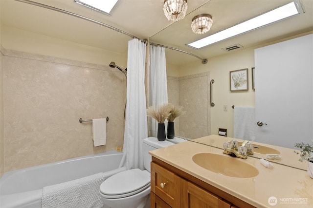 655 Main St Unit 304, Edmonds, WA 98020 - bathroom featuring toilet, shower / tub combo with curtain, and vanity