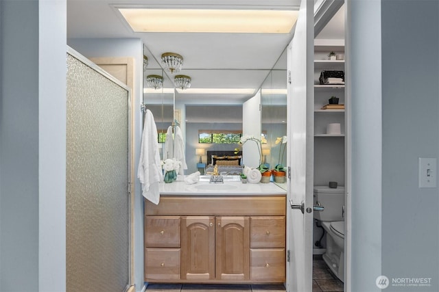 655 Main St Unit 304, Edmonds, WA 98020 - bathroom featuring a stall shower, vanity, and toilet
