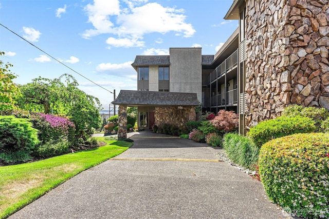 655 Main St Unit 304, Edmonds, WA 98020 - view of front of property featuring stone siding