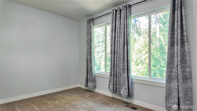 22470 Sunridge Way NE, Poulsbo, WA 98370 - carpeted spare room with healthy amount of natural light and baseboards